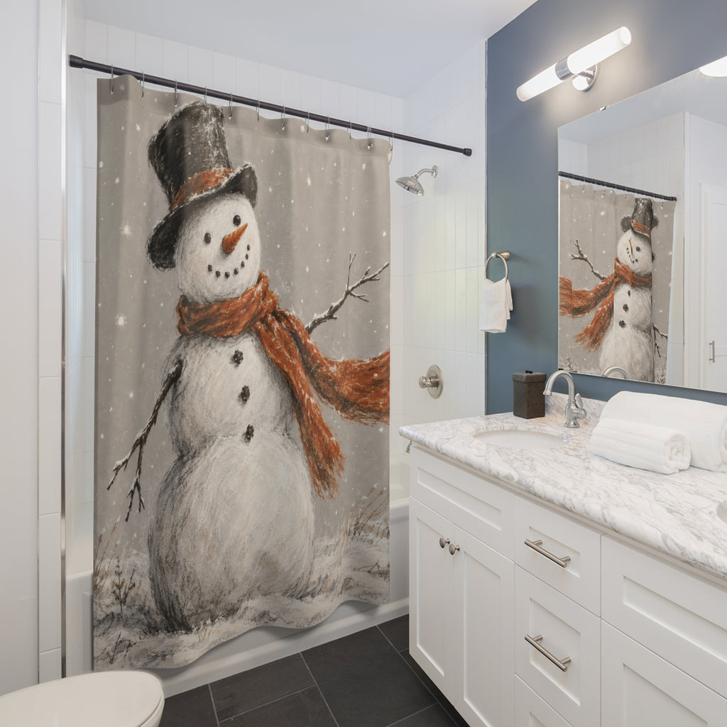 White snowman with orange scarf and black hat in grey snow shower curtain beside a white vanity