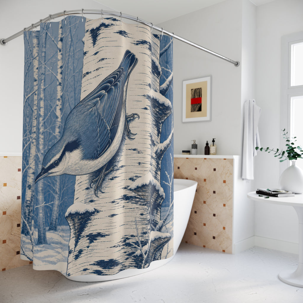 Blue nuthatch on snowy birch shower curtain beside a freestanding tub