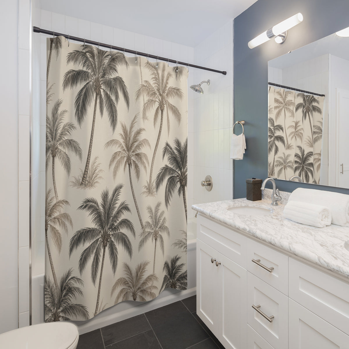 Charcoal and taupe palm trees in a cream botanical toile shower curtain beside a white vanity