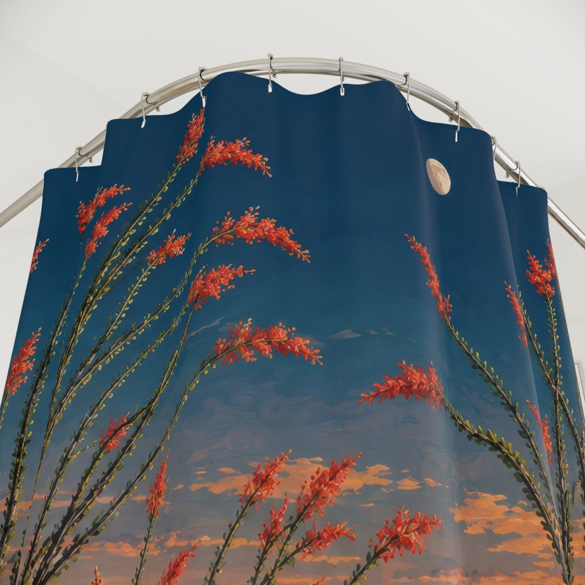 Red ocotillo flowers beneath a moon in blue and apricot sky shower curtain with close-up print, hooks, and folds