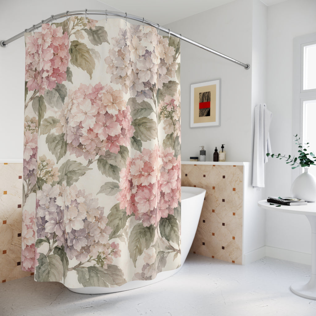 Blush hydrangeas and sage leaves on cream shower curtain beside a freestanding tub