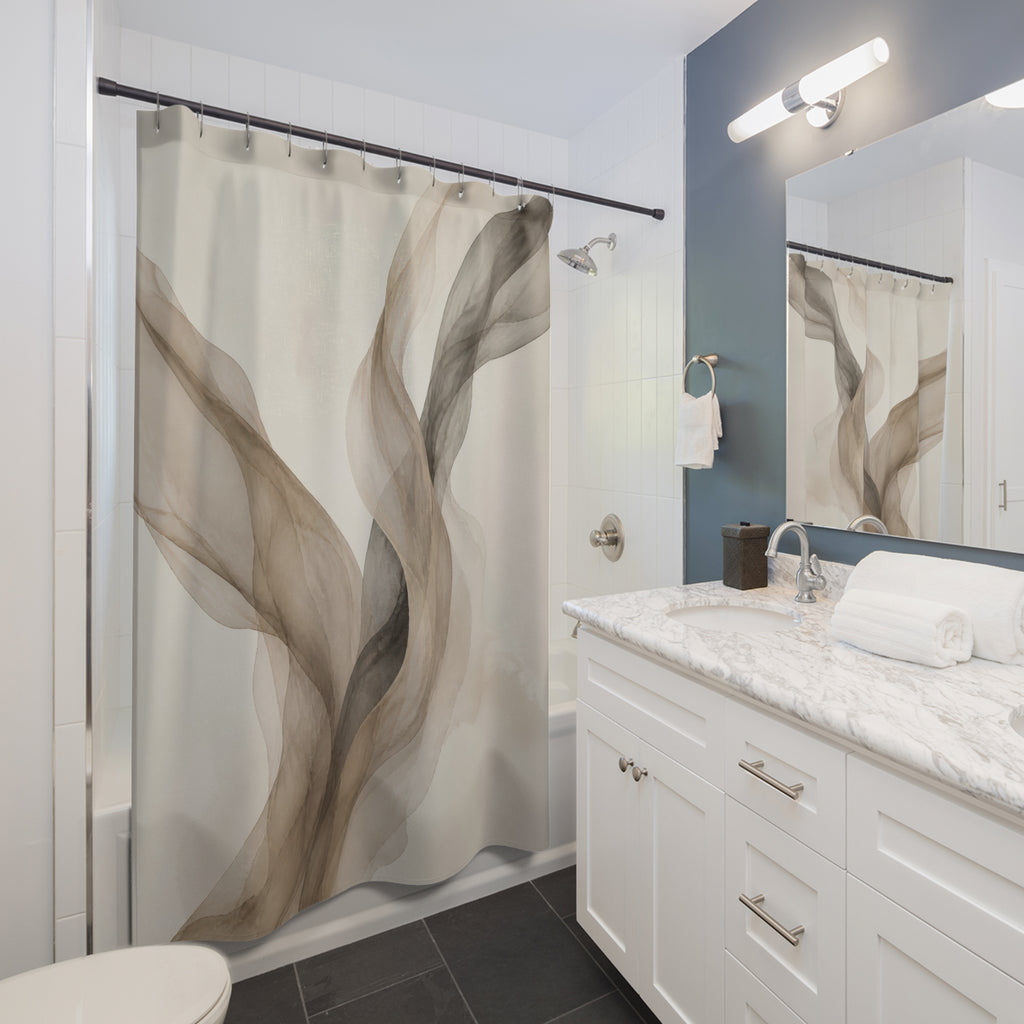 Flowing taupe mushroom and charcoal translucent ribbons shower curtain beside a white vanity