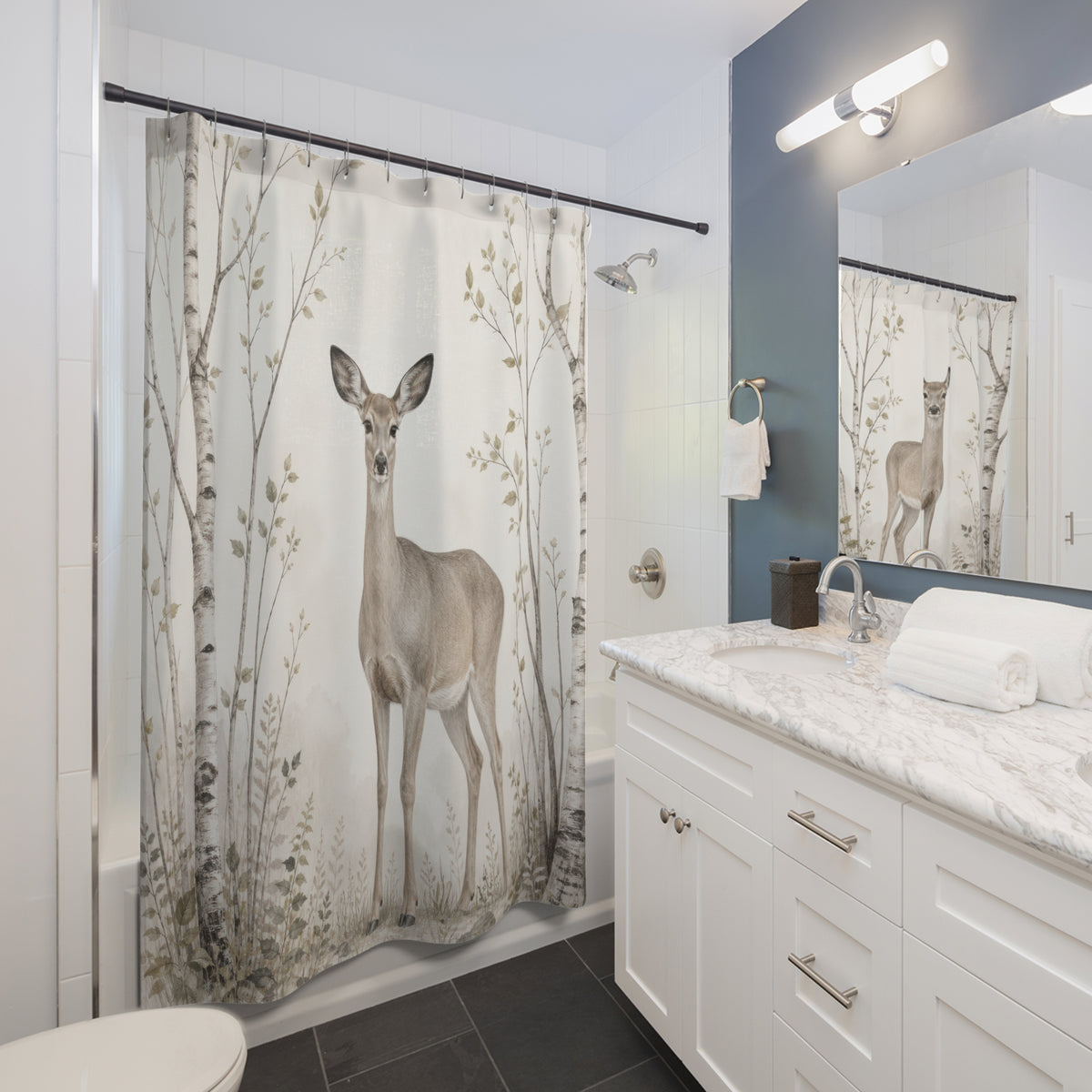 Graceful doe framed by airy birch saplings shower curtain beside a white vanity