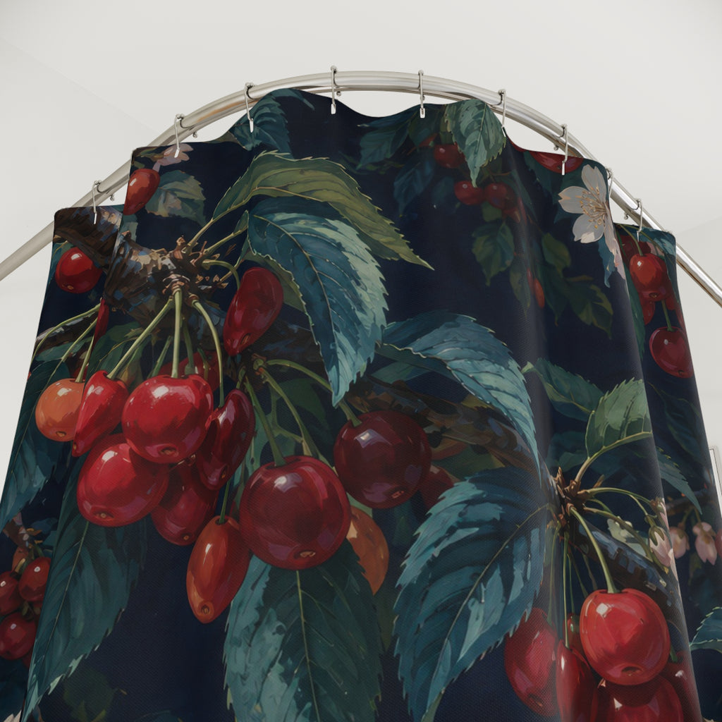 Red cherry branches with ivory blossoms on navy shower curtain with close-up print, hooks, and folds