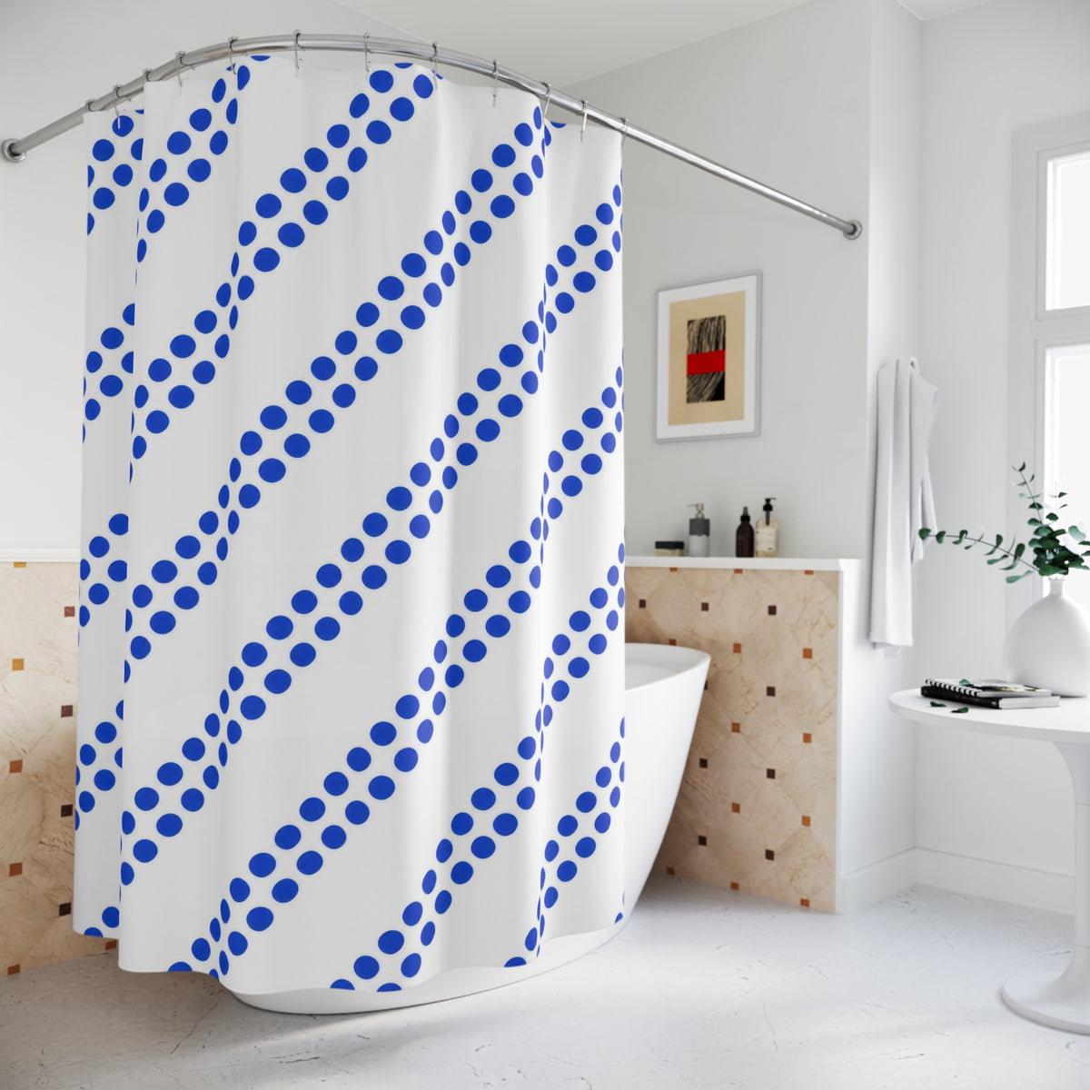 Paired diagonal cobalt dot stripes on white shower curtain beside a freestanding tub