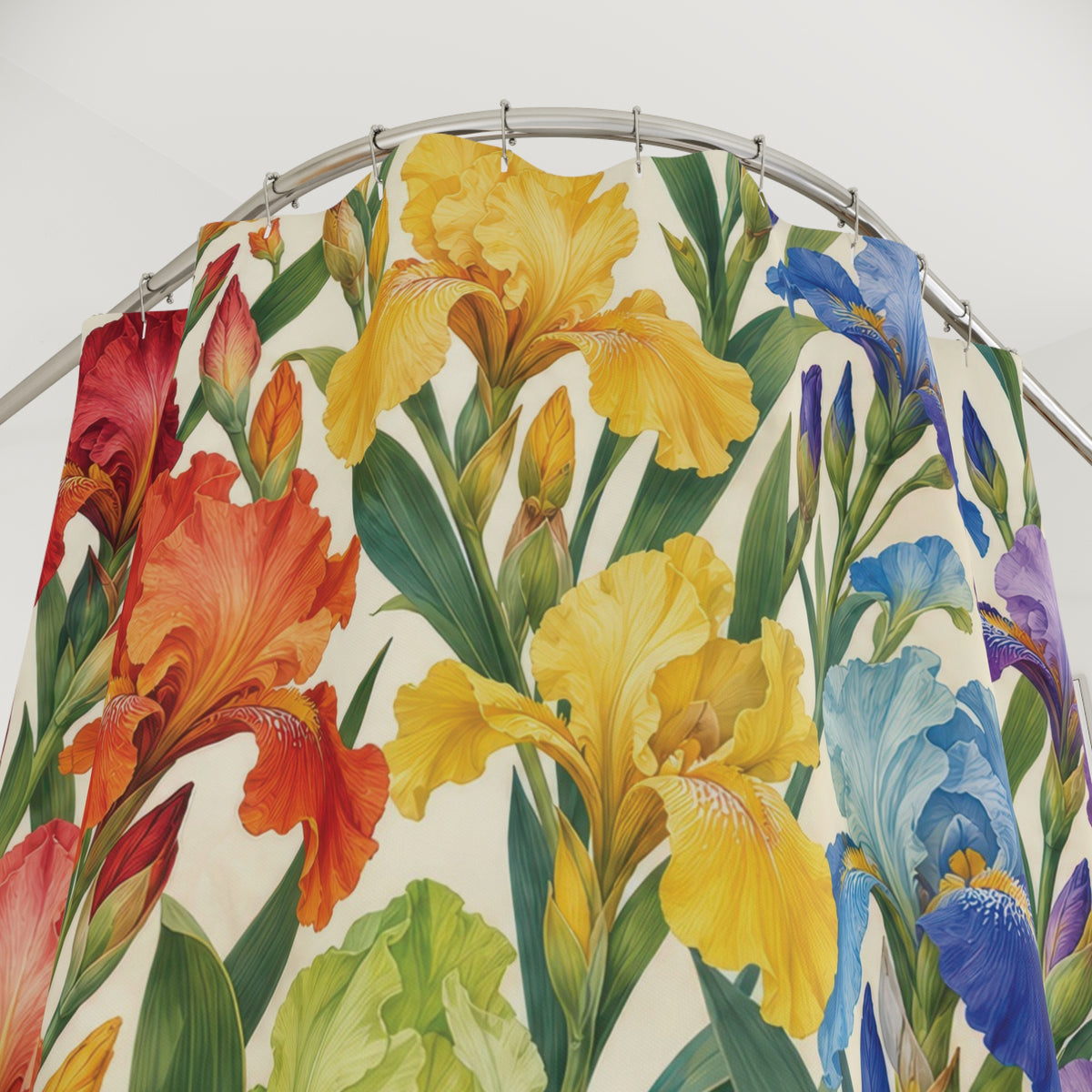 Rainbow iris flowers and green leaves on warm ivory shower curtain with close-up print, hooks, and folds