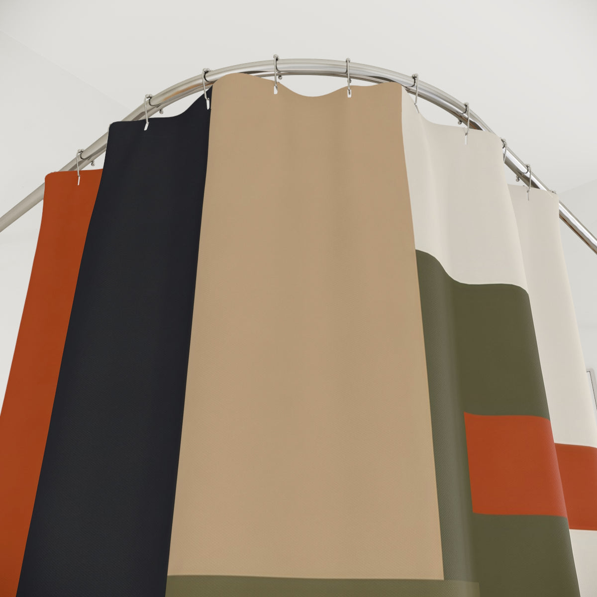 Charcoal rust and olive architectural blocks shower curtain with close-up print, hooks, and folds