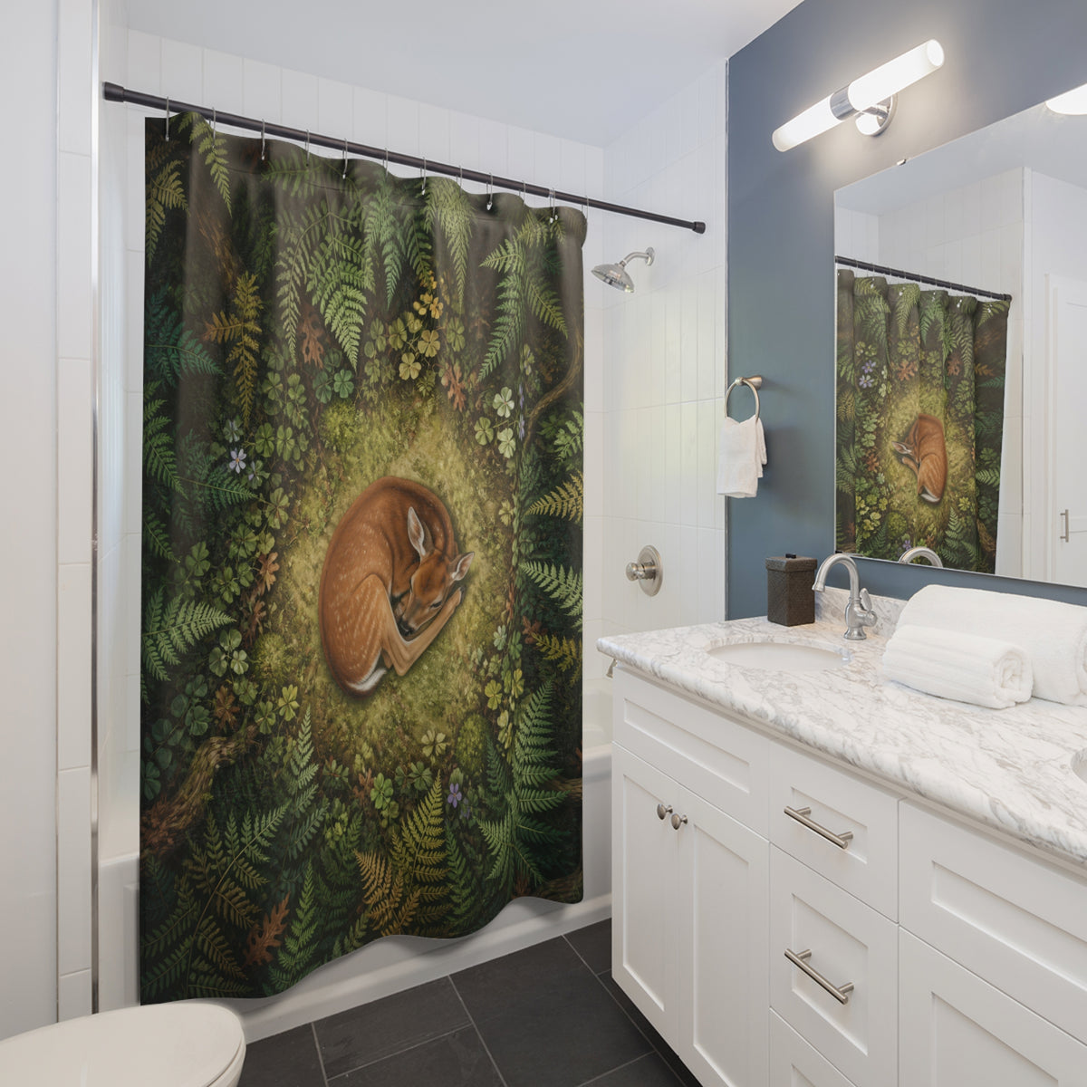 Resting fawn in a circular woodland fern clearing shower curtain beside a white vanity
