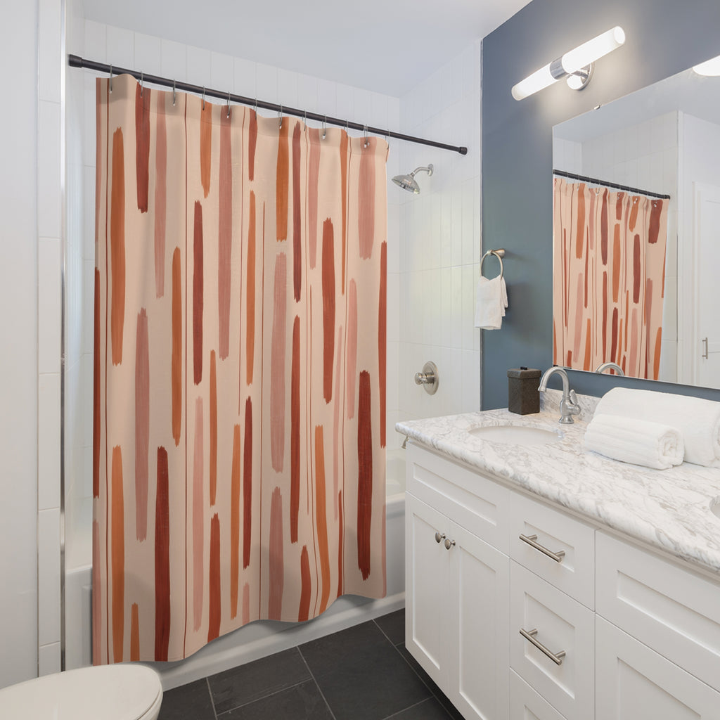 Terracotta rust and blush broken vertical strokes on peach shower curtain beside a white vanity