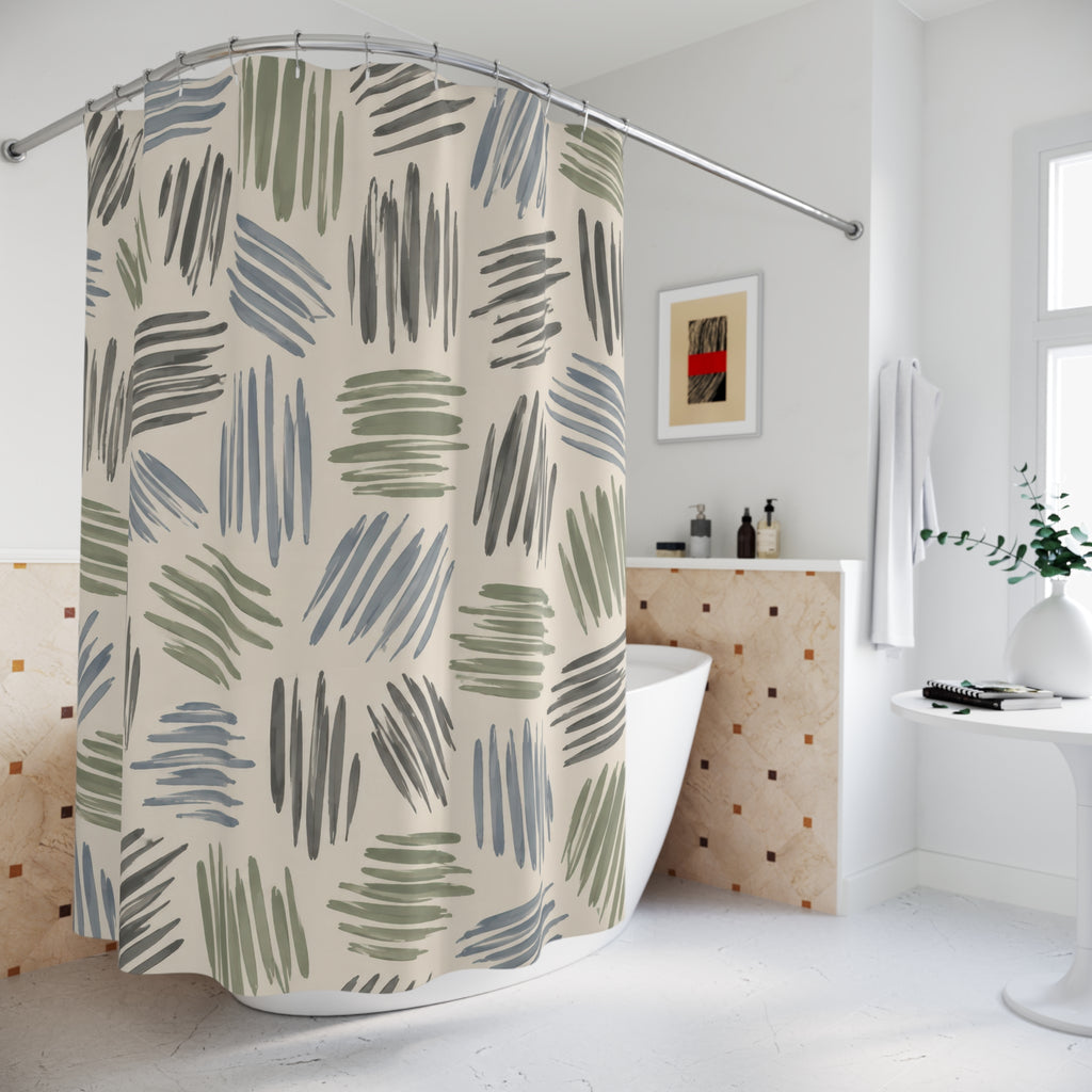 Sage, dusty blue and gray hatch marks on cream shower curtain beside a freestanding tub