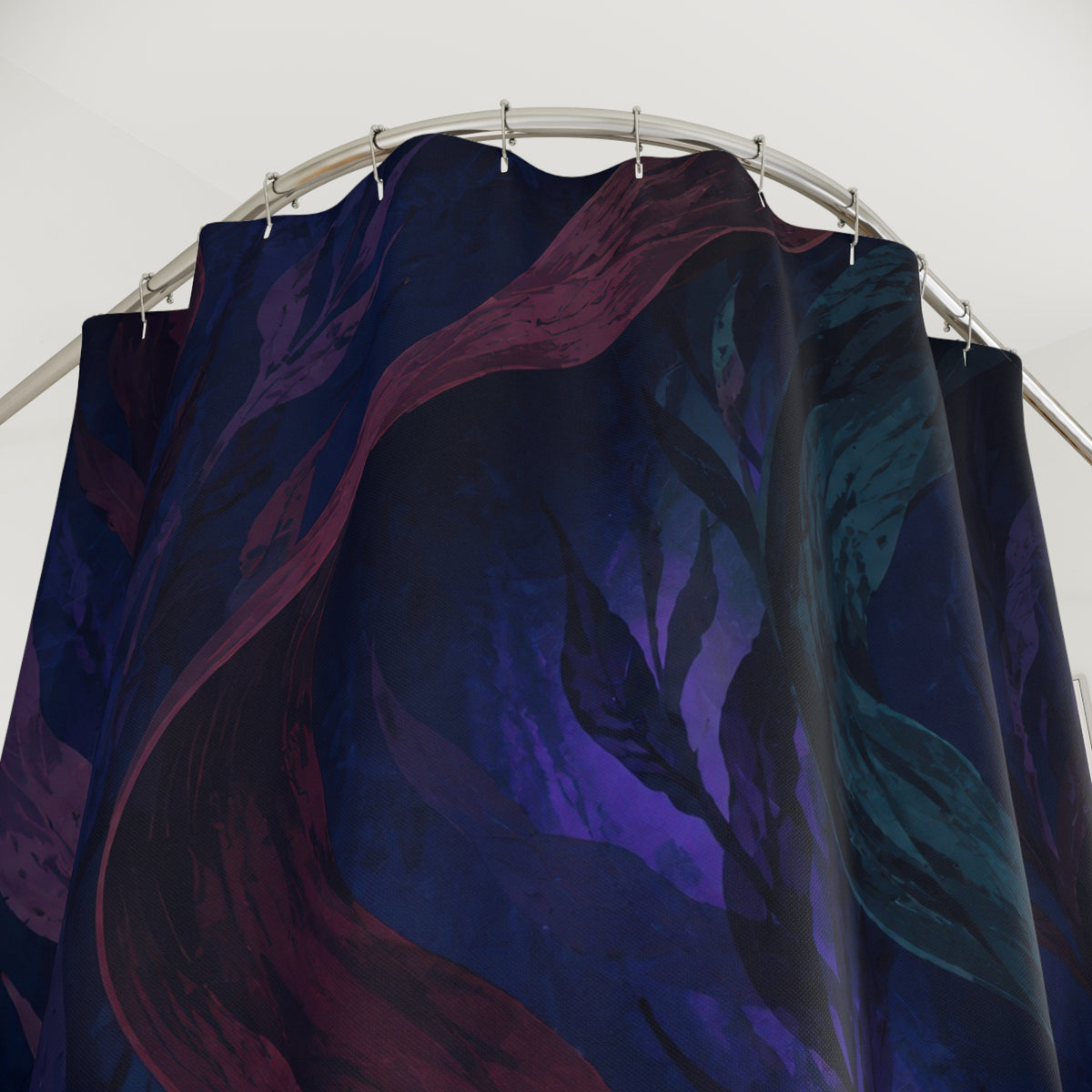 Burgundy and violet kelp ribbons on a blue-black ocean field shower curtain with close-up print, hooks, and folds