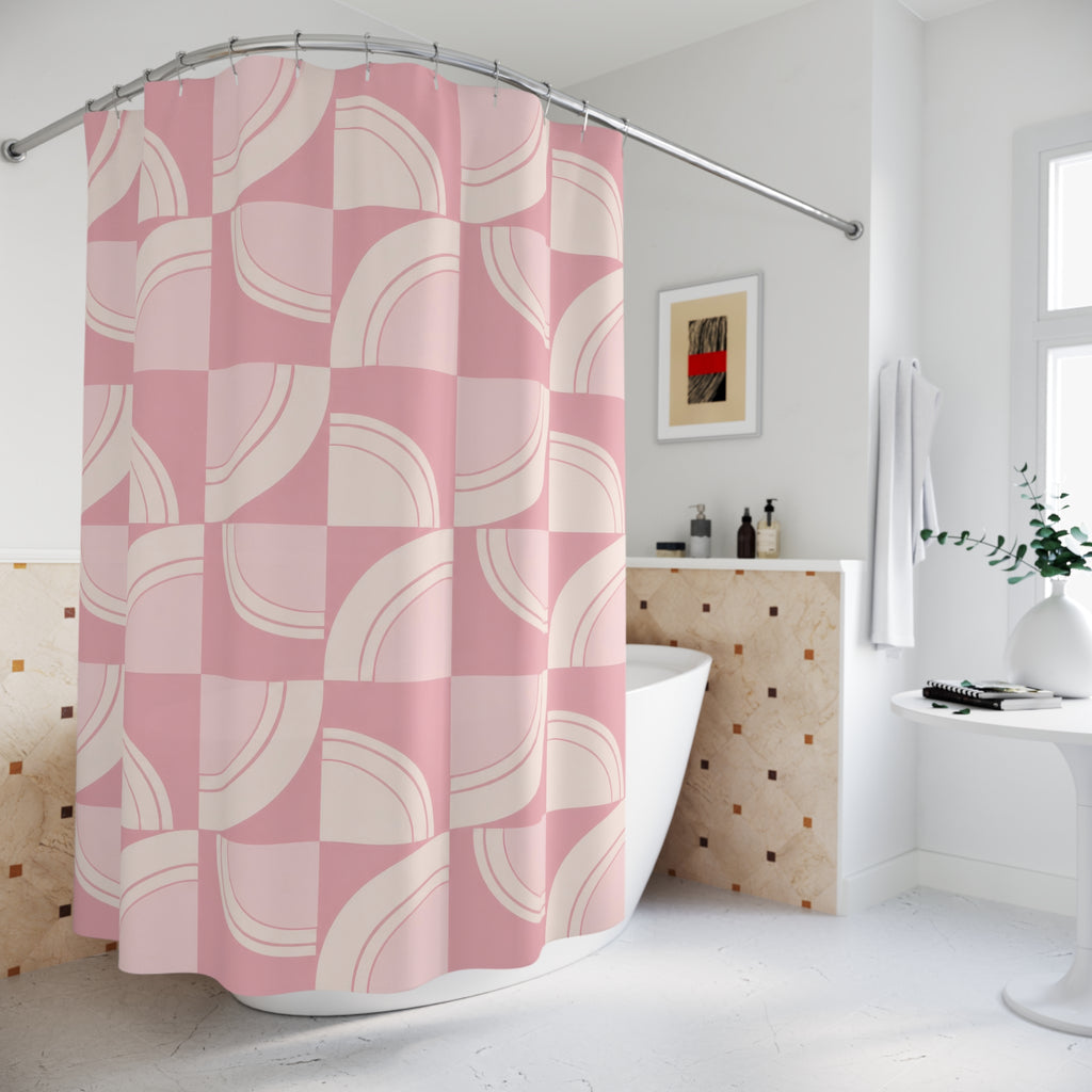 Light pink and cream retro arc tiles shower curtain beside a freestanding tub