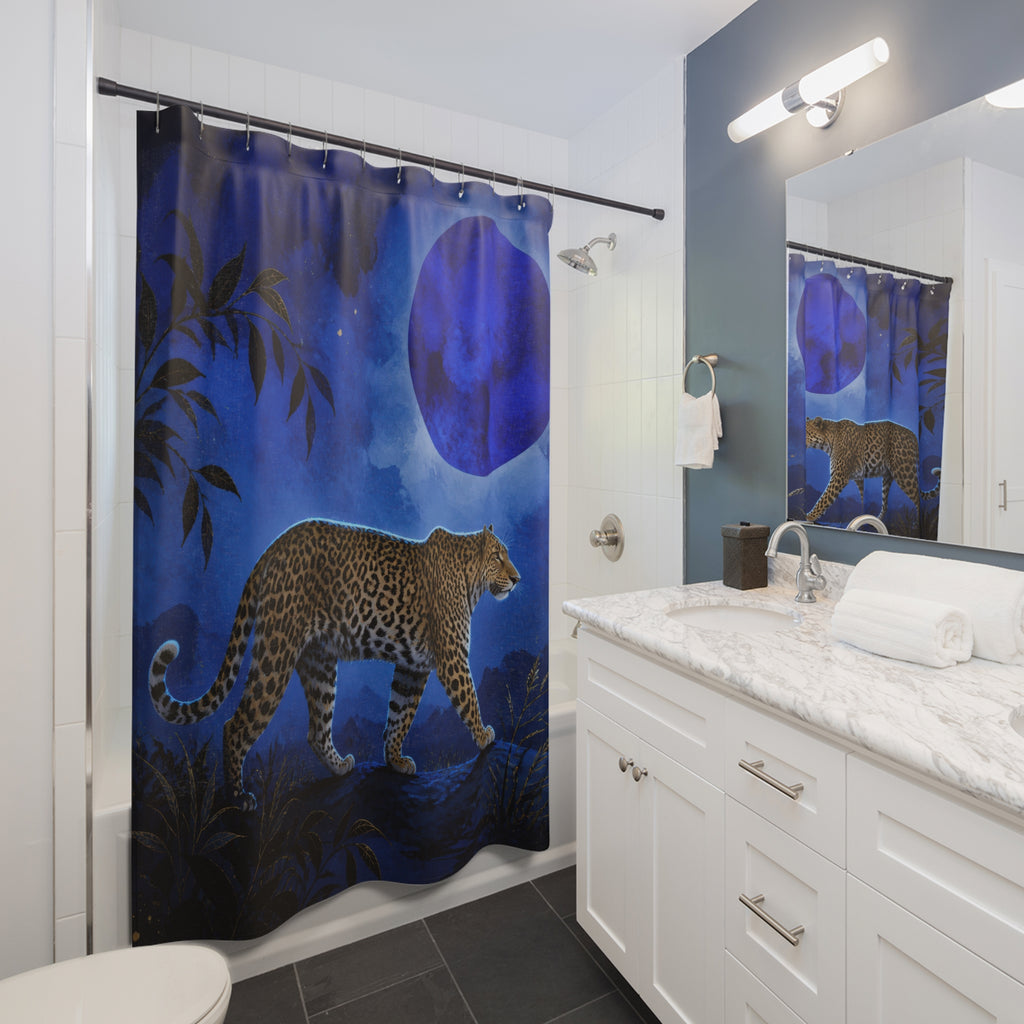 Cobalt moonlit jungle leopard shower curtain beside a white vanity