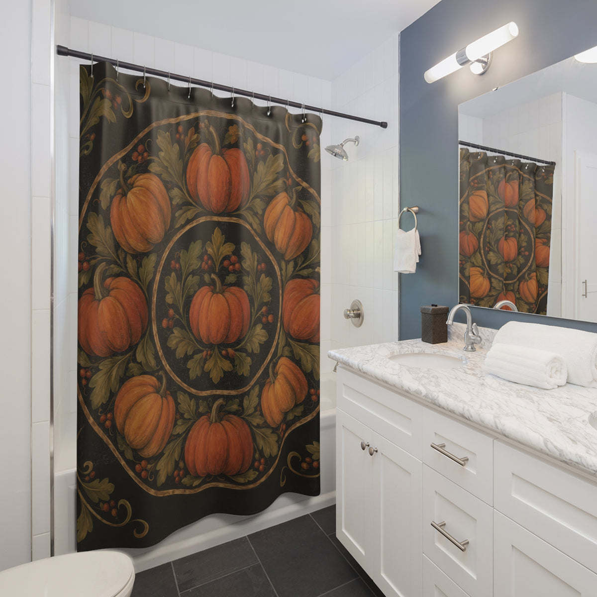 Orange pumpkins and olive leaves in an ochre medallion on black shower curtain beside a white vanity