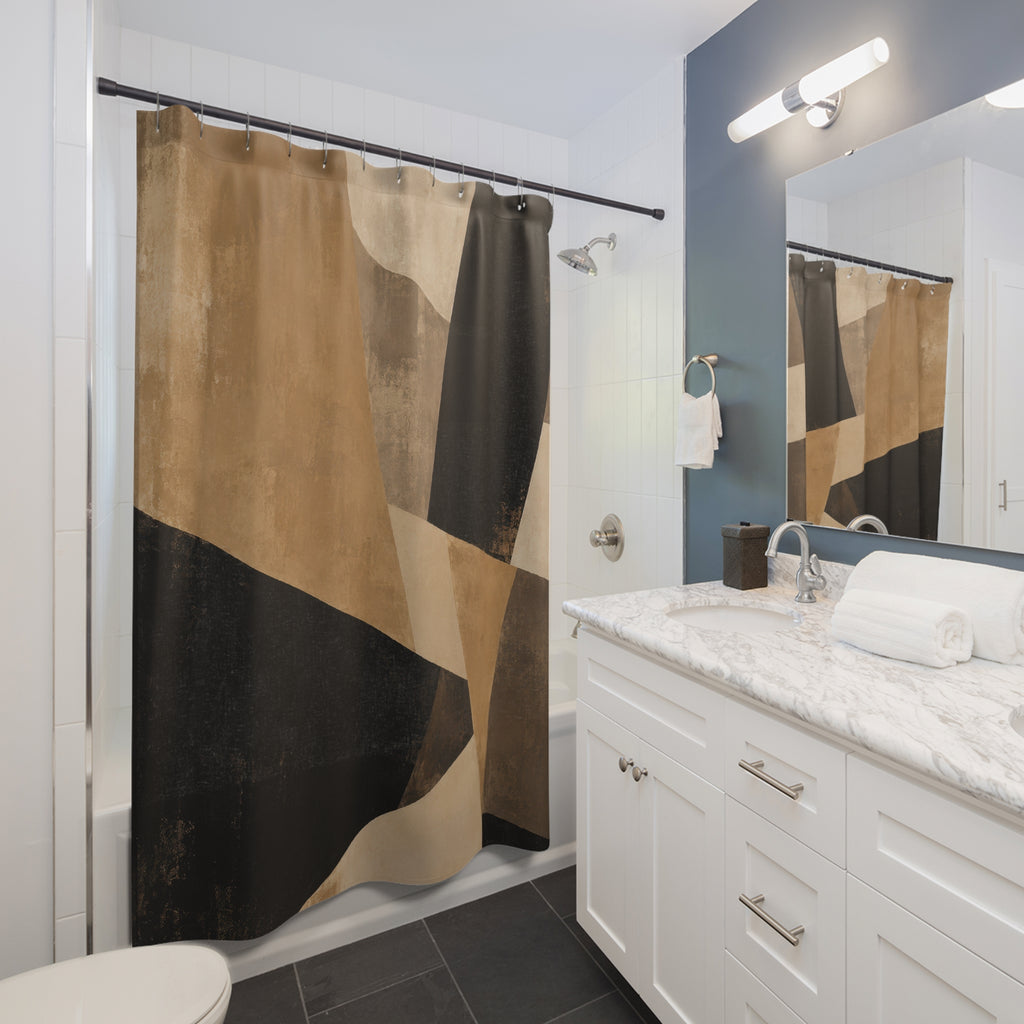 Black and tan angular abstract shower curtain beside a white vanity