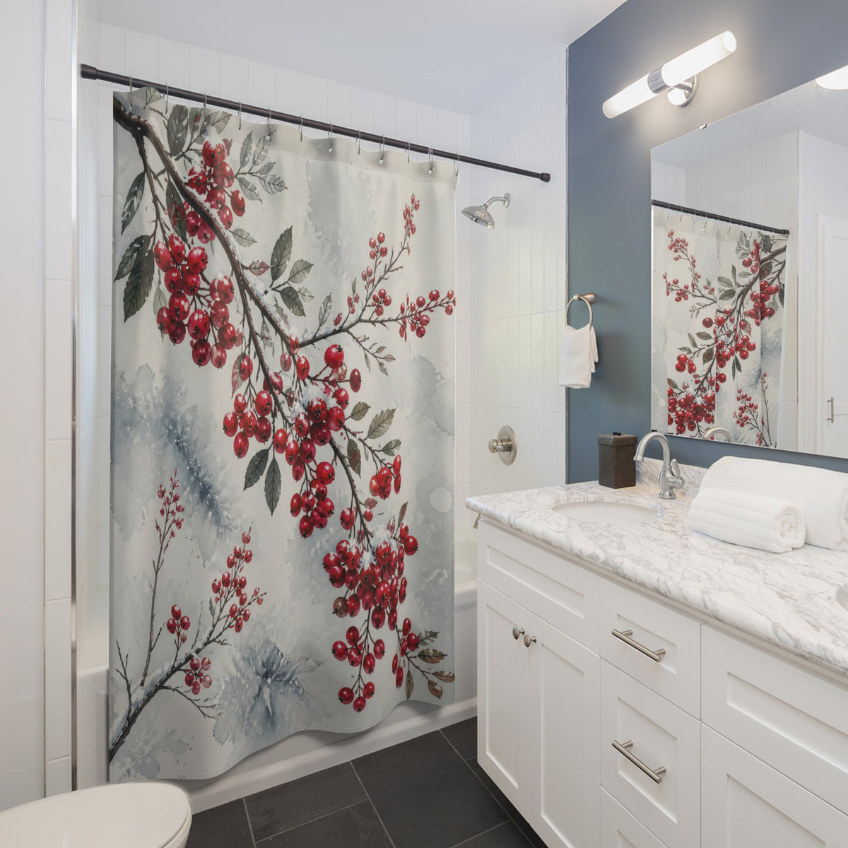 Snowy red winter berry branches in watercolor shower curtain beside a white vanity