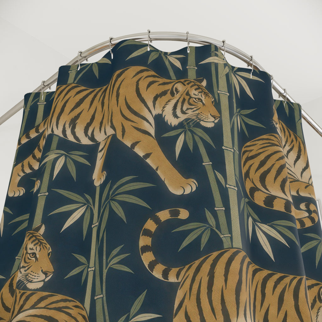 Ochre tiger and olive bamboo pattern on indigo shower curtain with close-up print, hooks, and folds