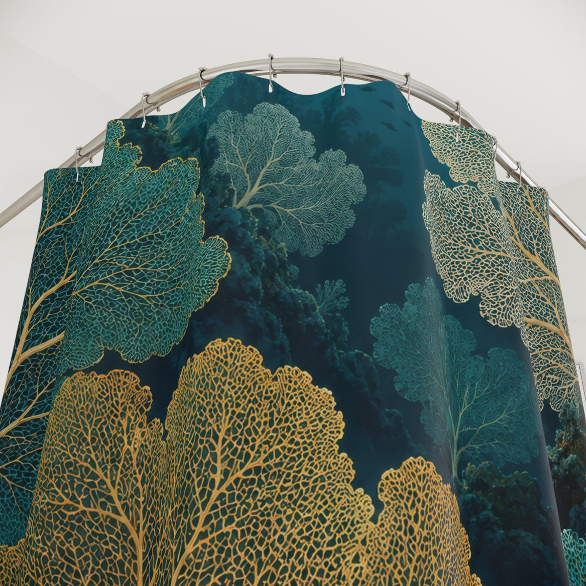 Gold, cream and turquoise sea fan coral in a deep teal reef shower curtain with close-up print, hooks, and folds