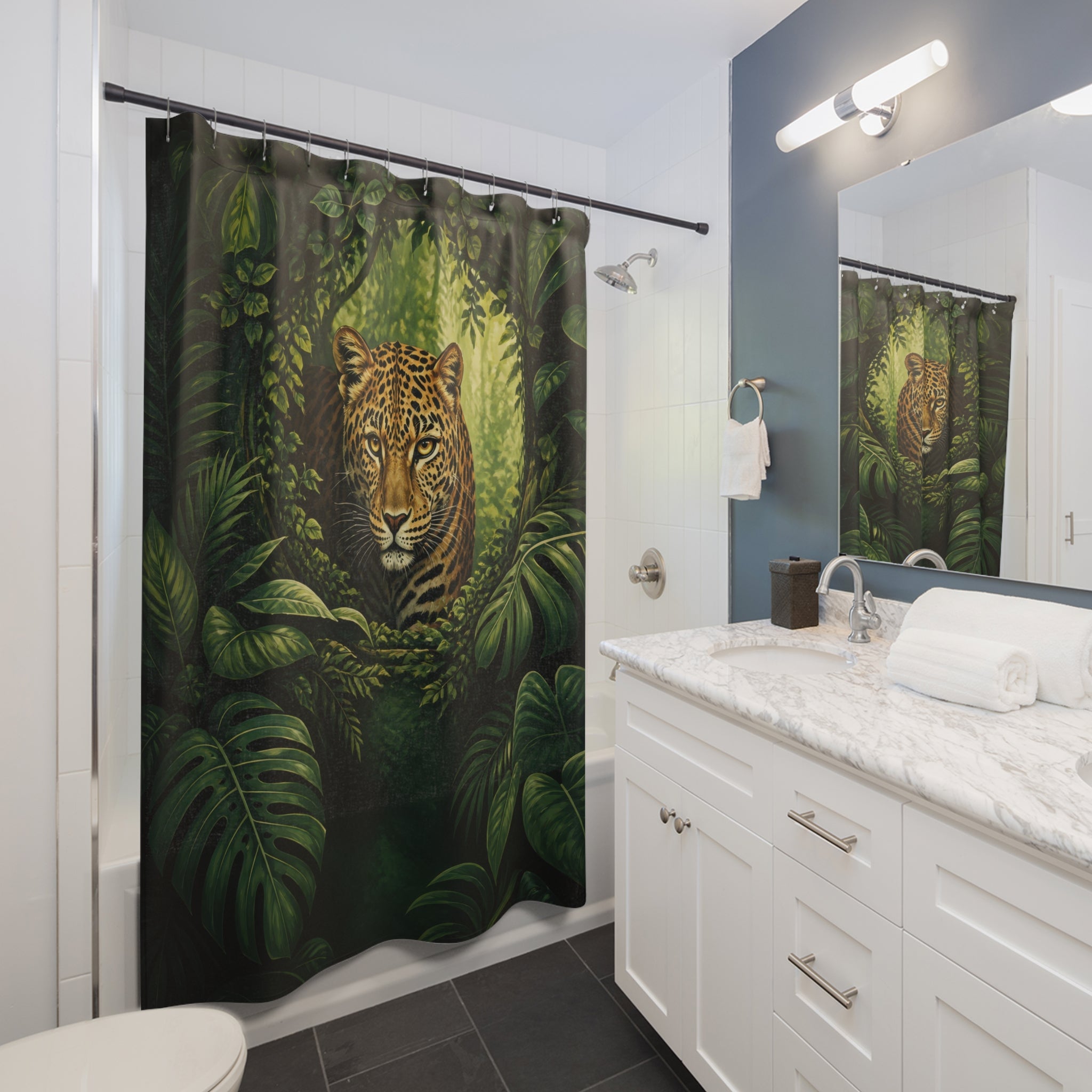 Emerald rainforest leopard portrait shower curtain beside a white vanity
