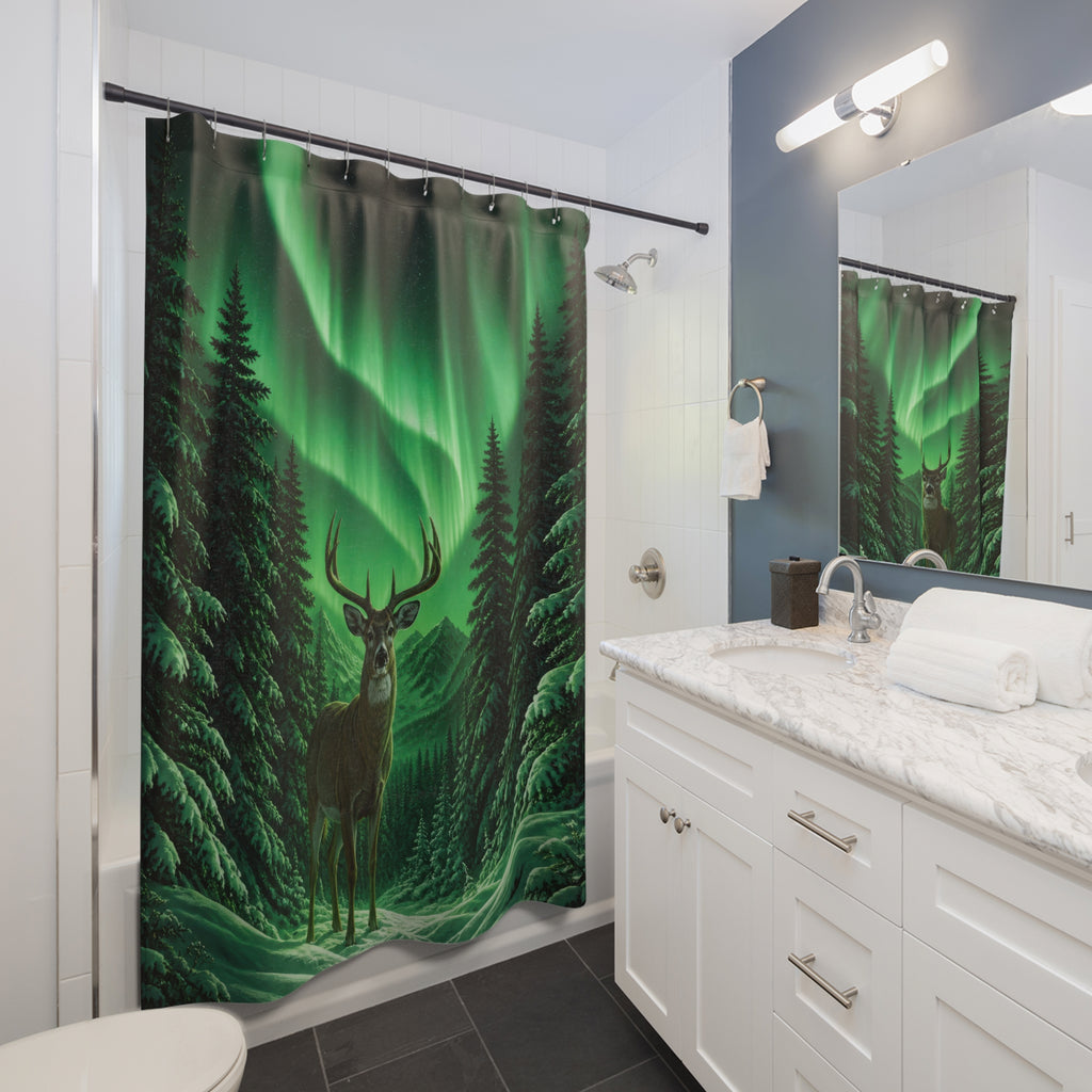 Buck under green aurora in snowy pines shower curtain beside a white vanity