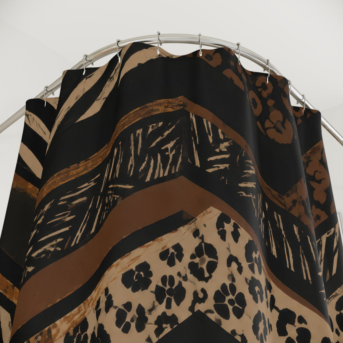 Black and saddle animal prints in layered chevrons shower curtain with close-up print, hooks, and folds