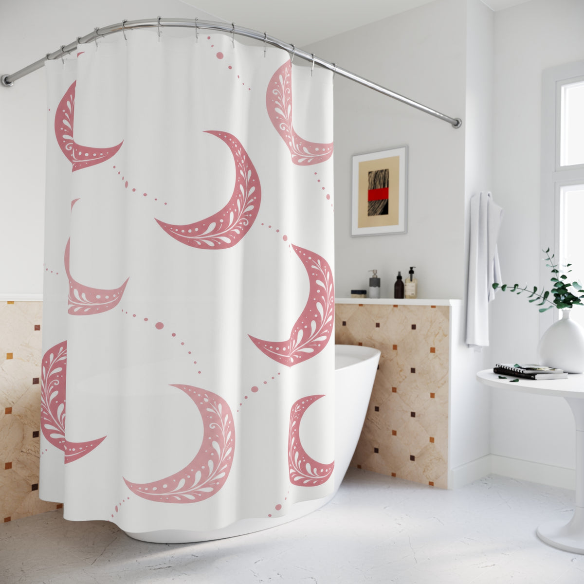 Pink crescent moons with white sprigs and dotted trails shower curtain beside a freestanding tub