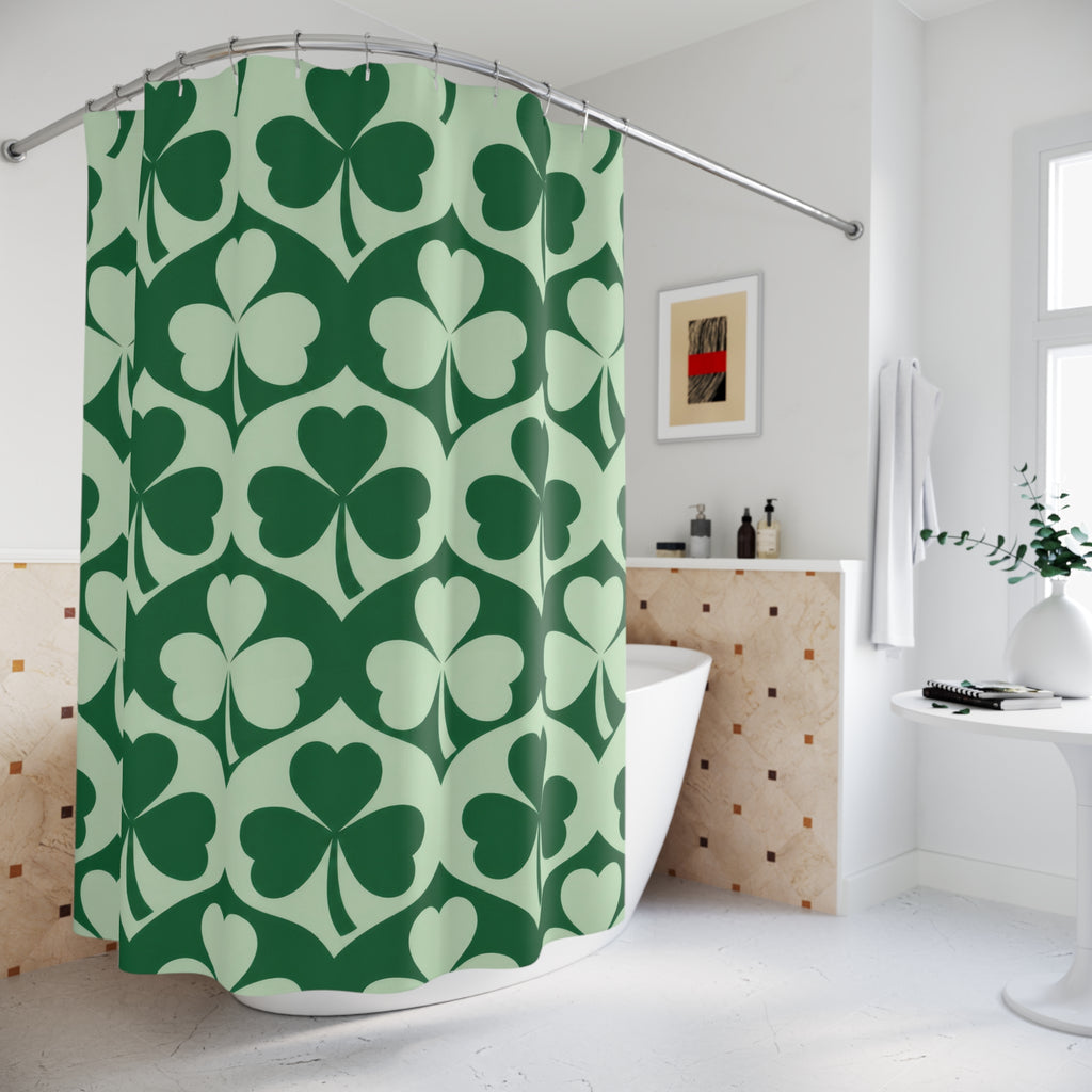 Emerald and mint green shamrock pattern shower curtain beside a freestanding tub