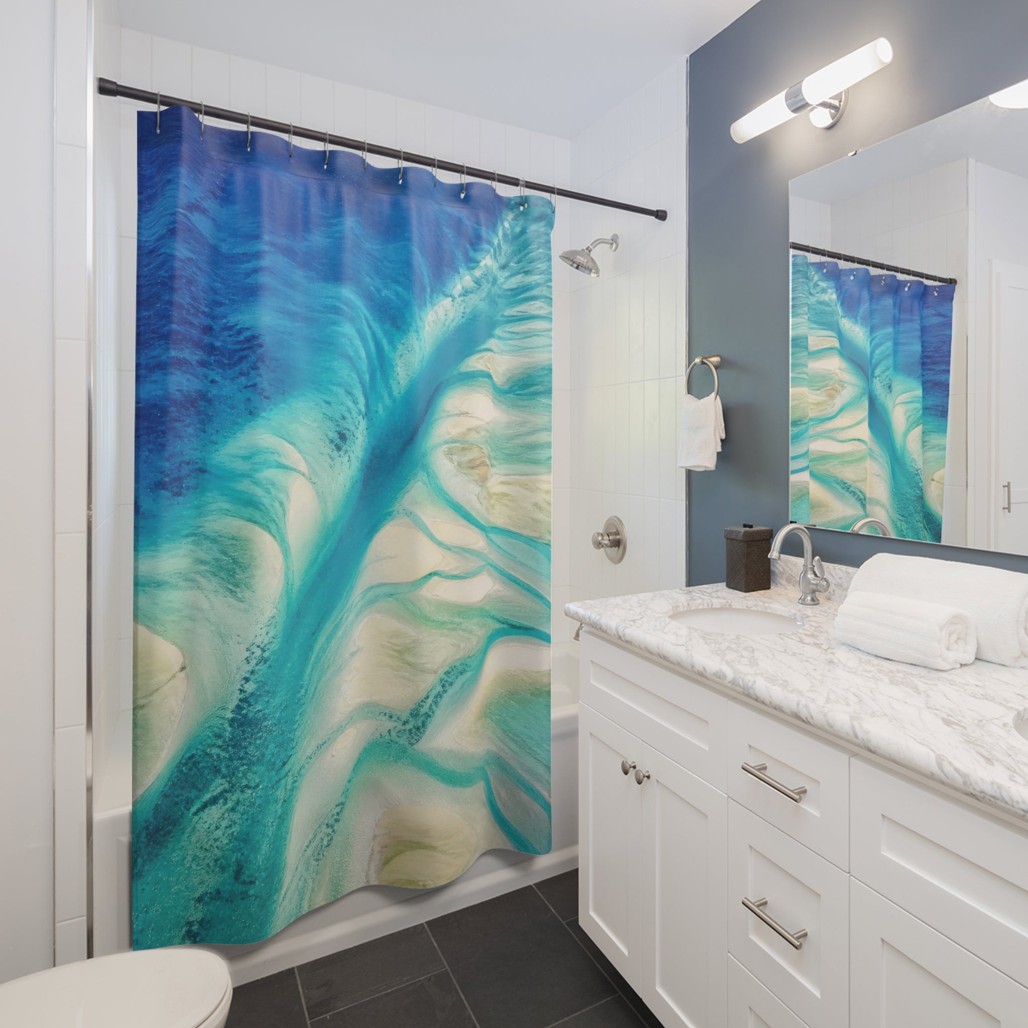 Aerial turquoise ocean channels over ivory sandbars shower curtain beside a white vanity