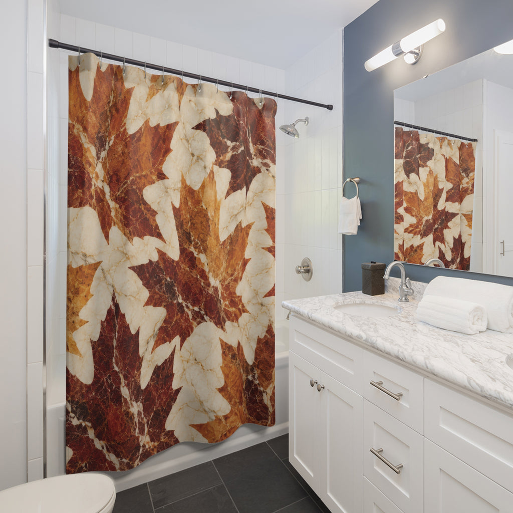 Rust and burgundy marble maple leaves on ivory shower curtain beside a white vanity