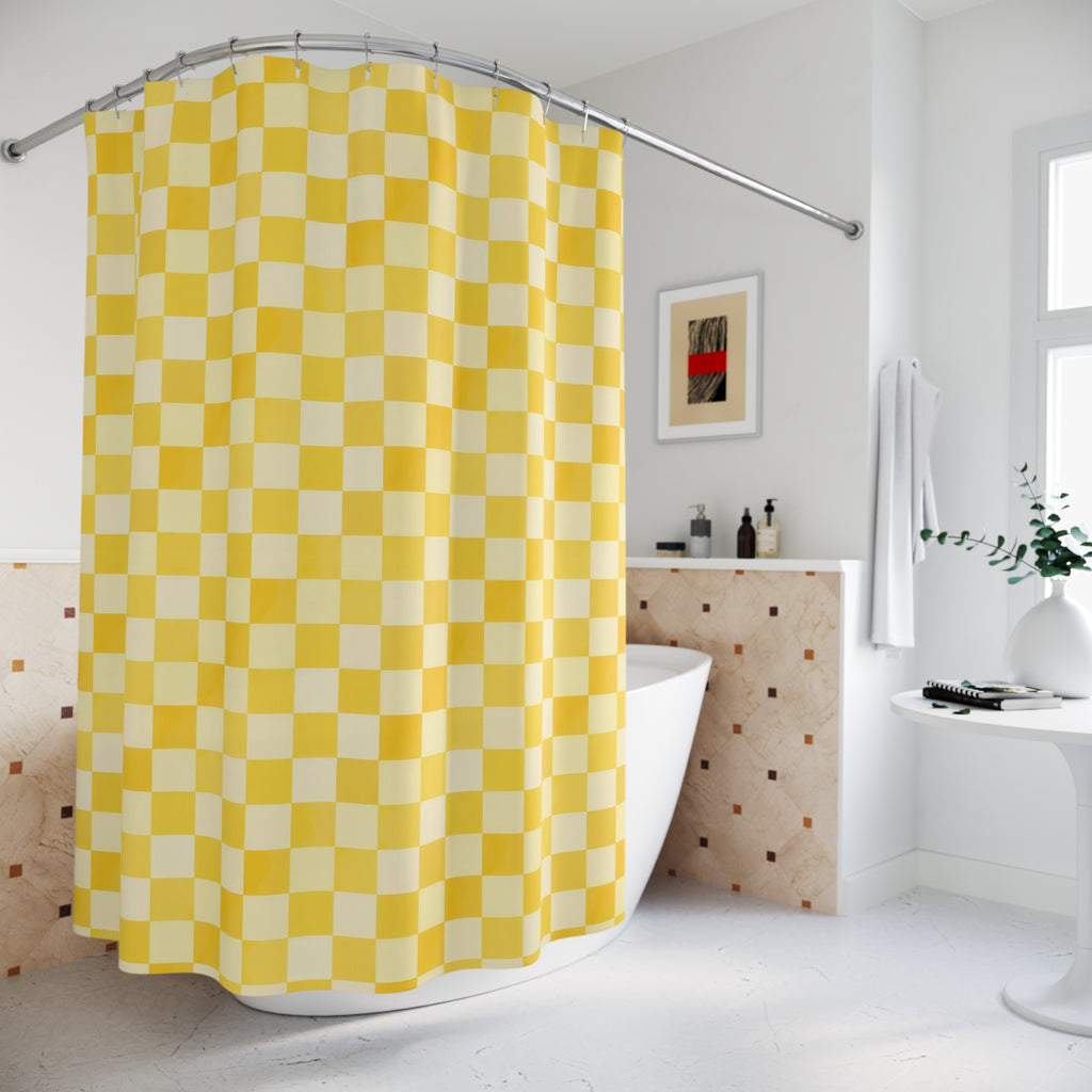 Butter yellow and cream micro checkerboard shower curtain beside a freestanding tub