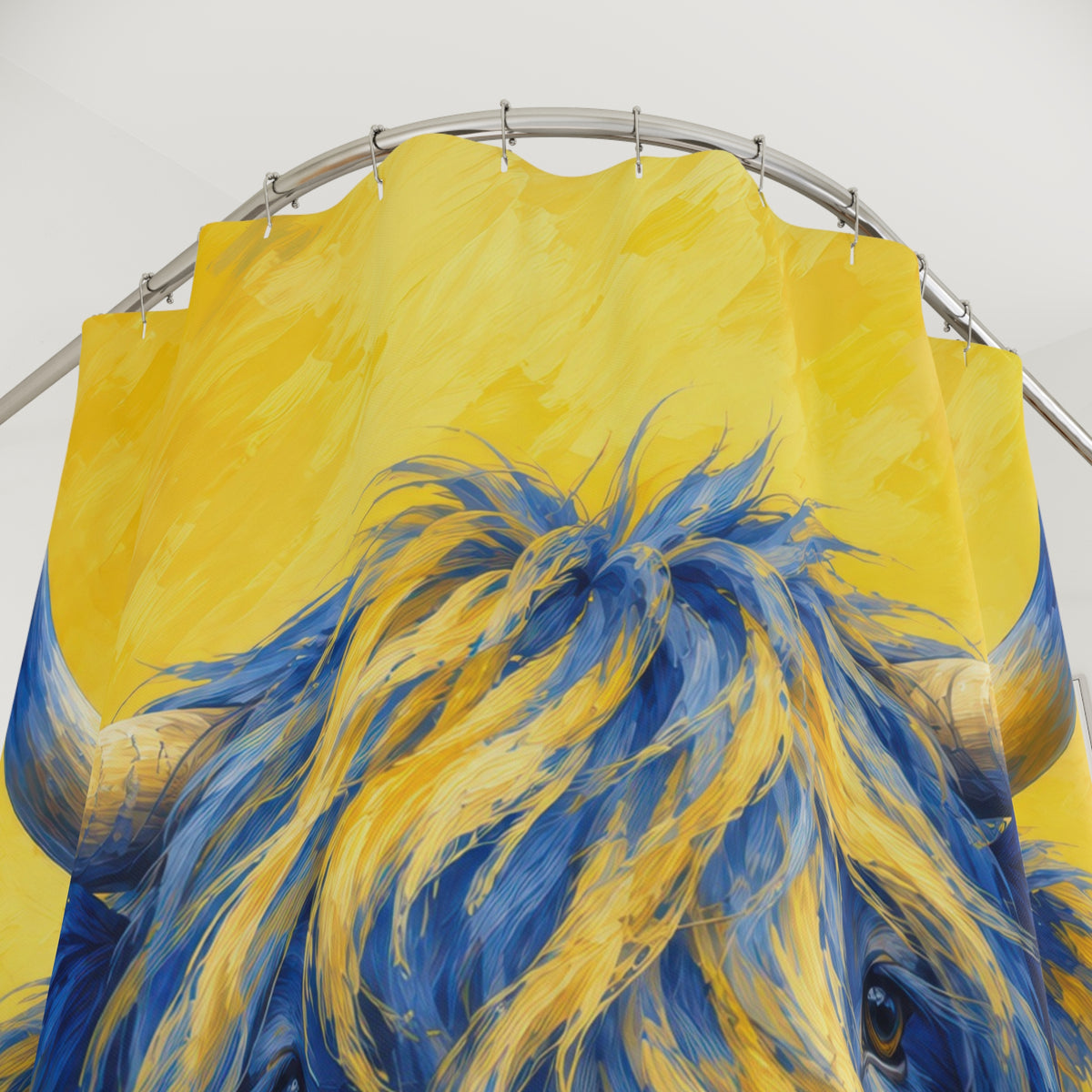 Blue Highland cow with yellow highlights on a yellow ground shower curtain with close-up print, hooks, and folds