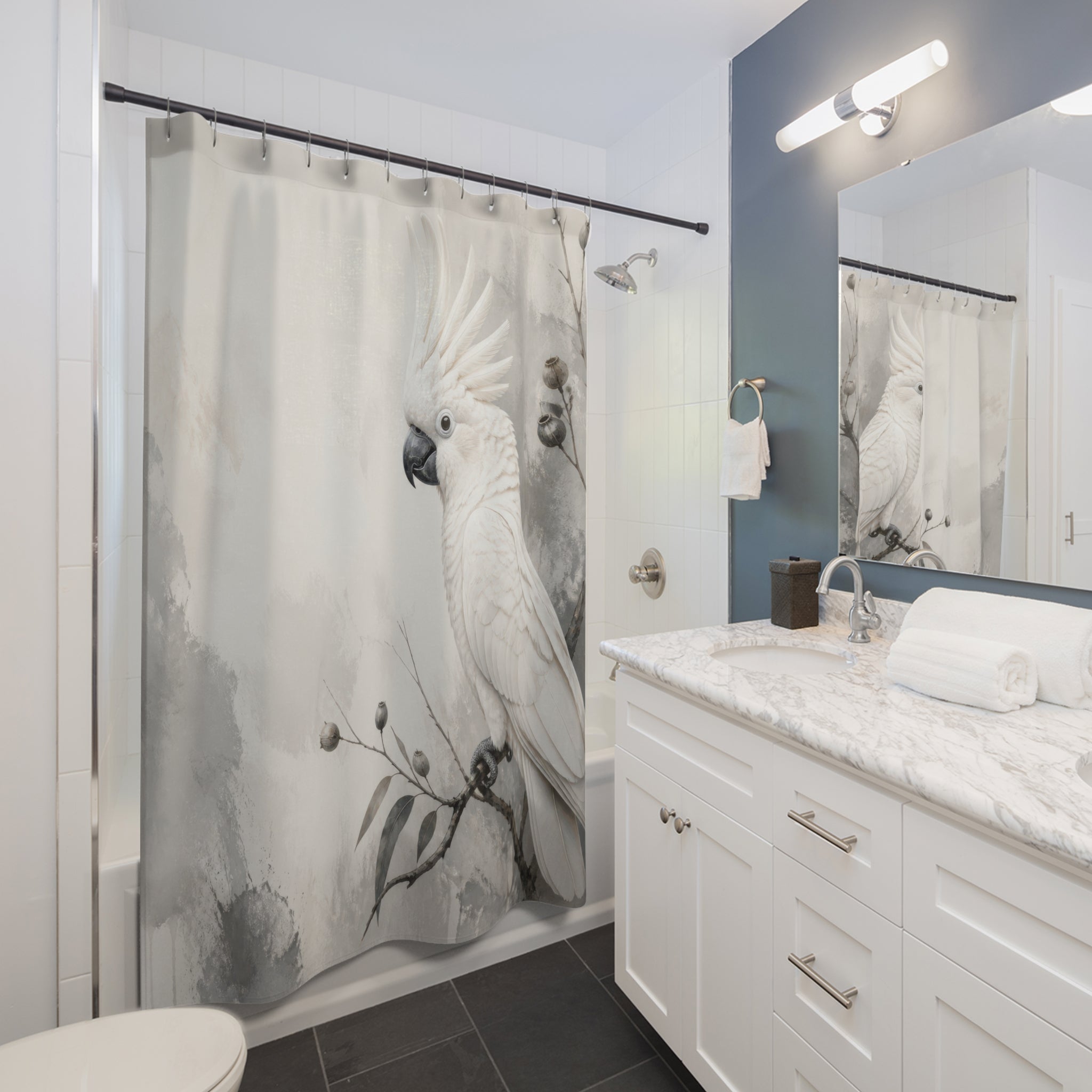 White cockatoo perched in soft grey ink wash foliage shower curtain installed beside a white vanity