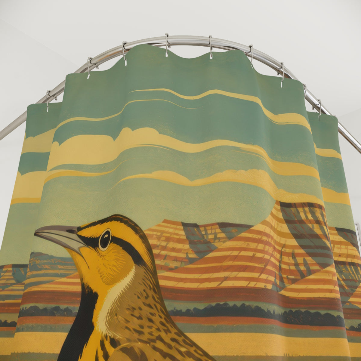 Golden yellow meadow bird before layered hills shower curtain with close-up print, hooks, and folds