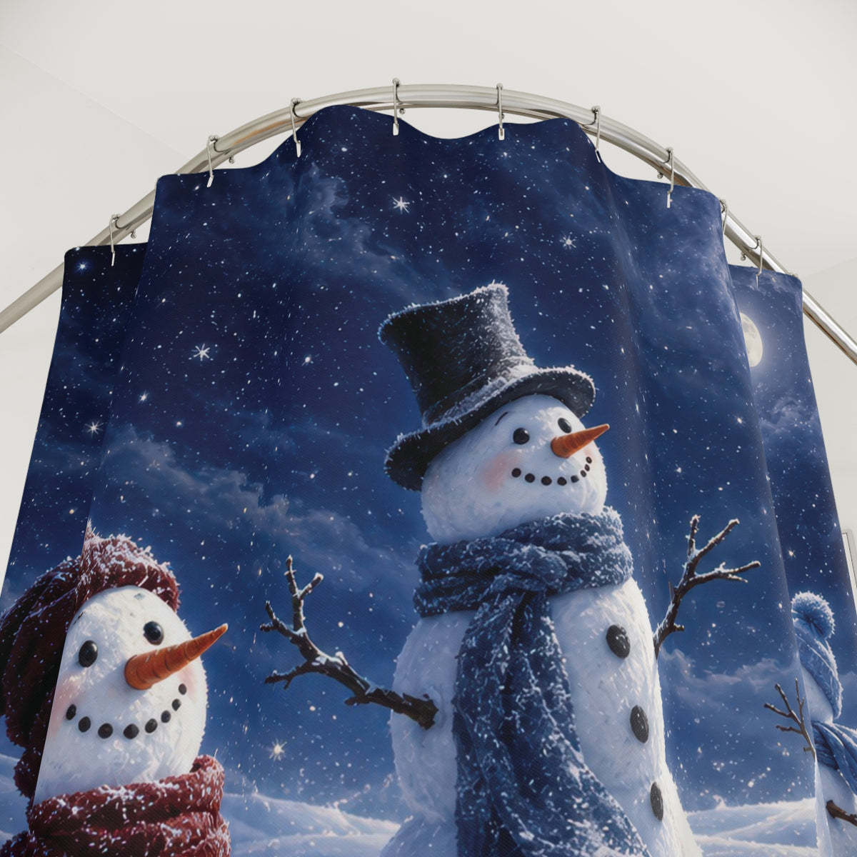 Three white snowmen in blue moonlit drifts, red and blue scarves shower curtain with close-up print, hooks, and folds