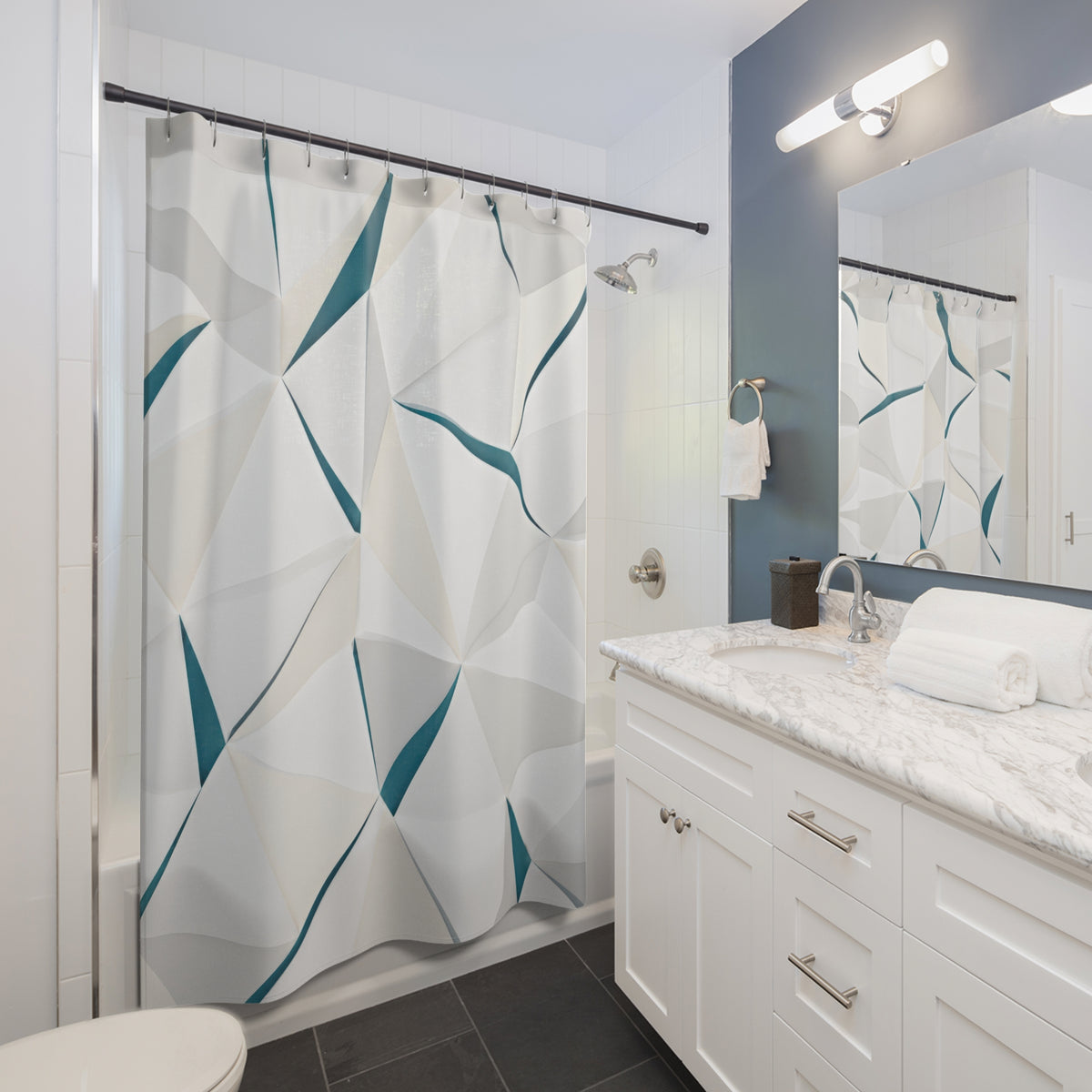 White triangular prism lattice divided by narrow teal seams shower curtain beside a white vanity