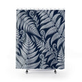 White fern fronds and curled fiddleheads on deep navy shower curtain with full front view