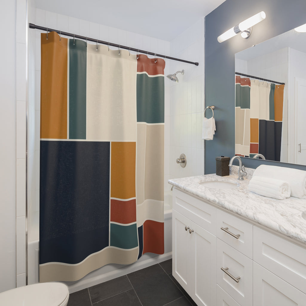 Navy ochre and teal geometric block grid shower curtain beside a white vanity