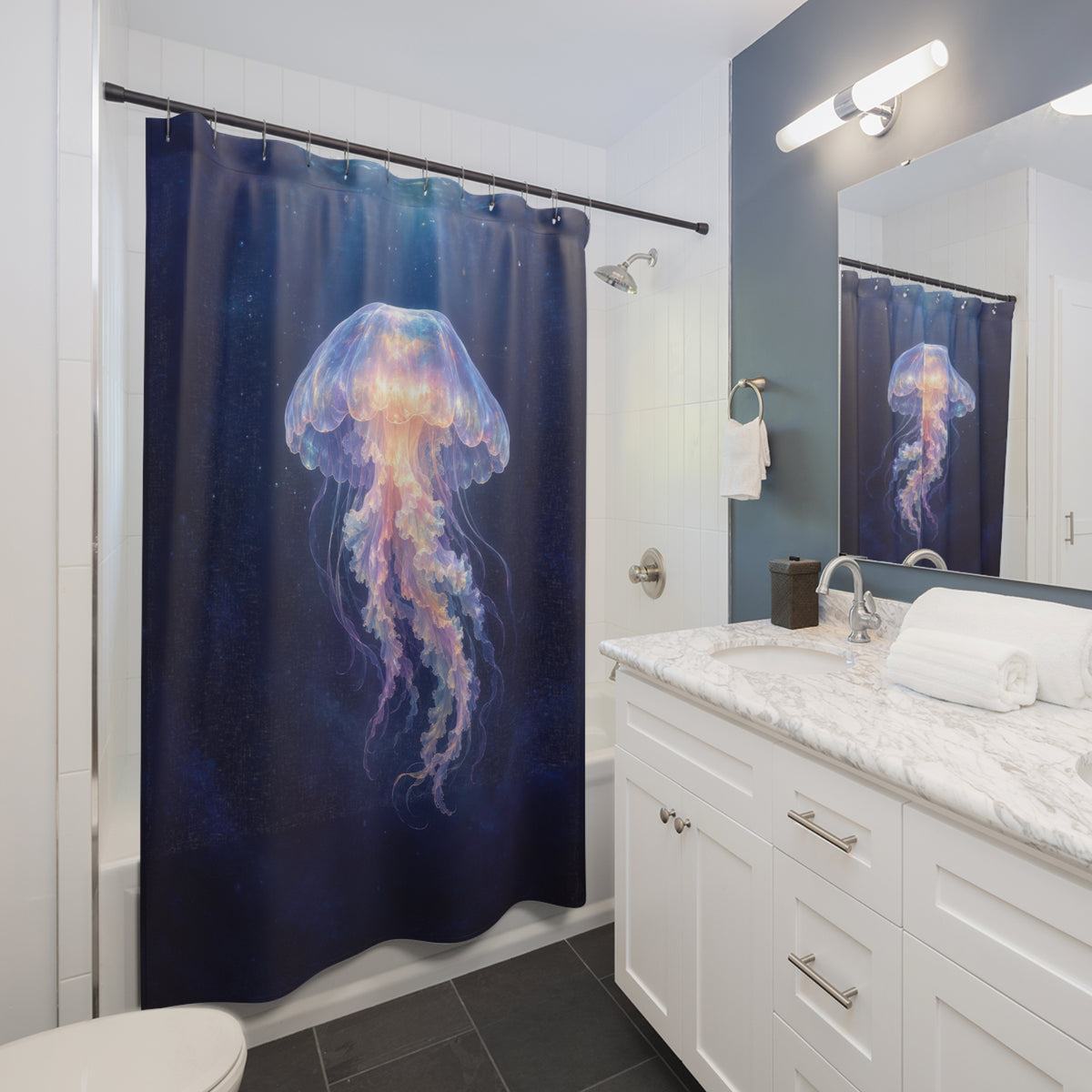Opalescent jellyfish in deep blue water shower curtain beside a white vanity