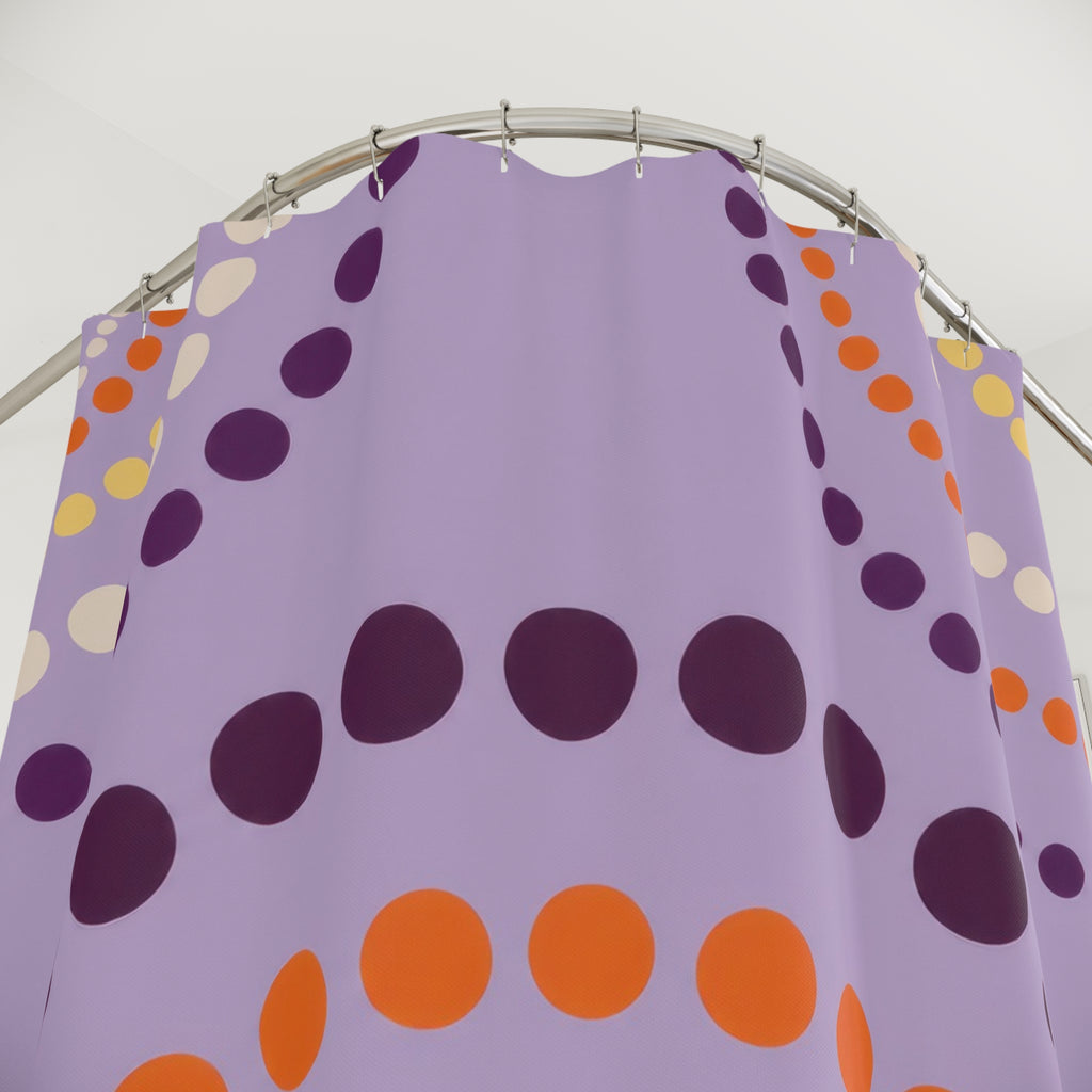 Purple polka dot arches with orange accents shower curtain with close-up print, hooks, and folds