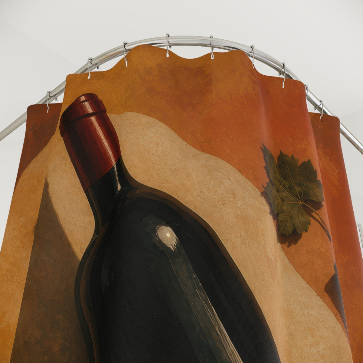 Diagonal wine bottle with cork and grape leaf shower curtain with close-up print, hooks, and folds