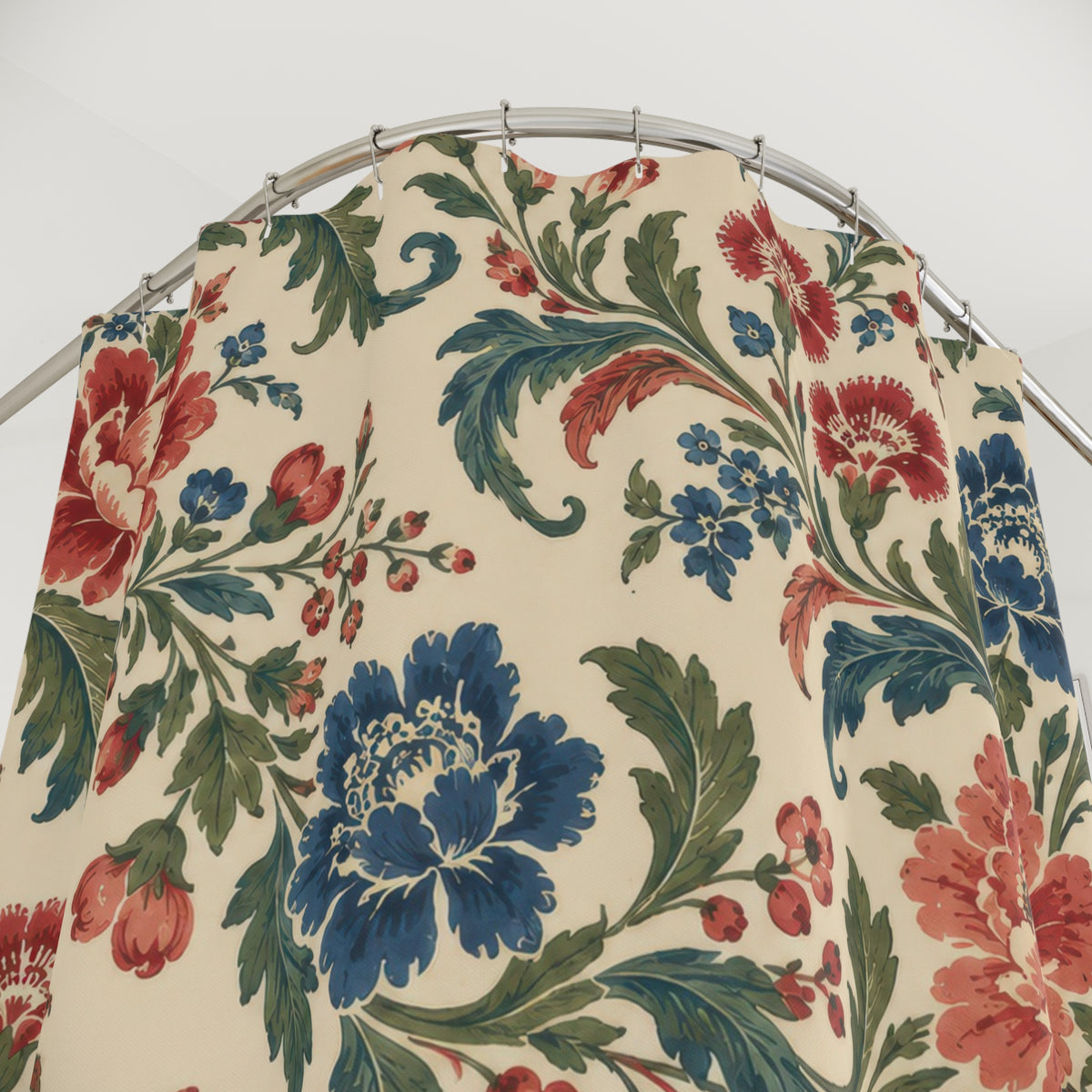 Red and blue chintz flowers with curling green leaves shower curtain with close-up print, hooks, and folds