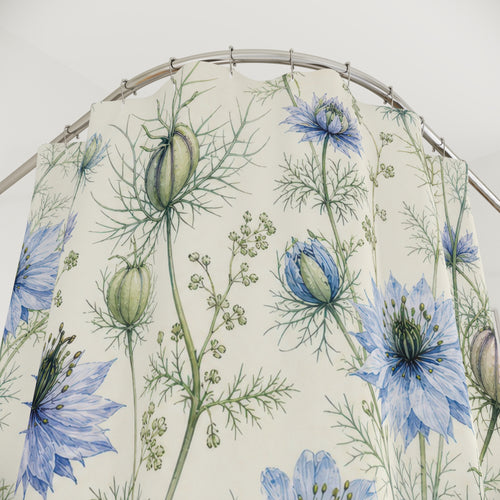Airy Blue Love In A Mist Wildflower shower curtain with close-up print, hooks, and folds