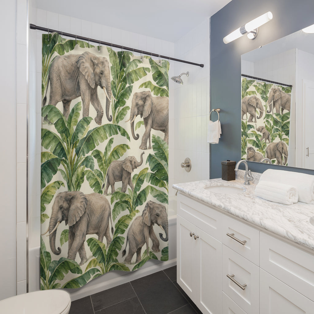 Elephant and green banana leaf pattern shower curtain beside a white vanity