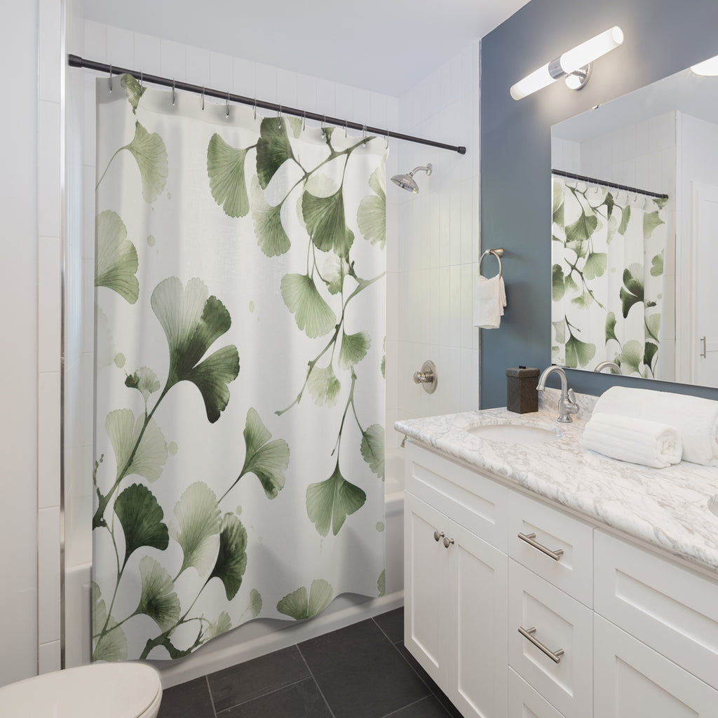 Watercolor Ginkgo Leaf green white shower curtain beside a white vanity