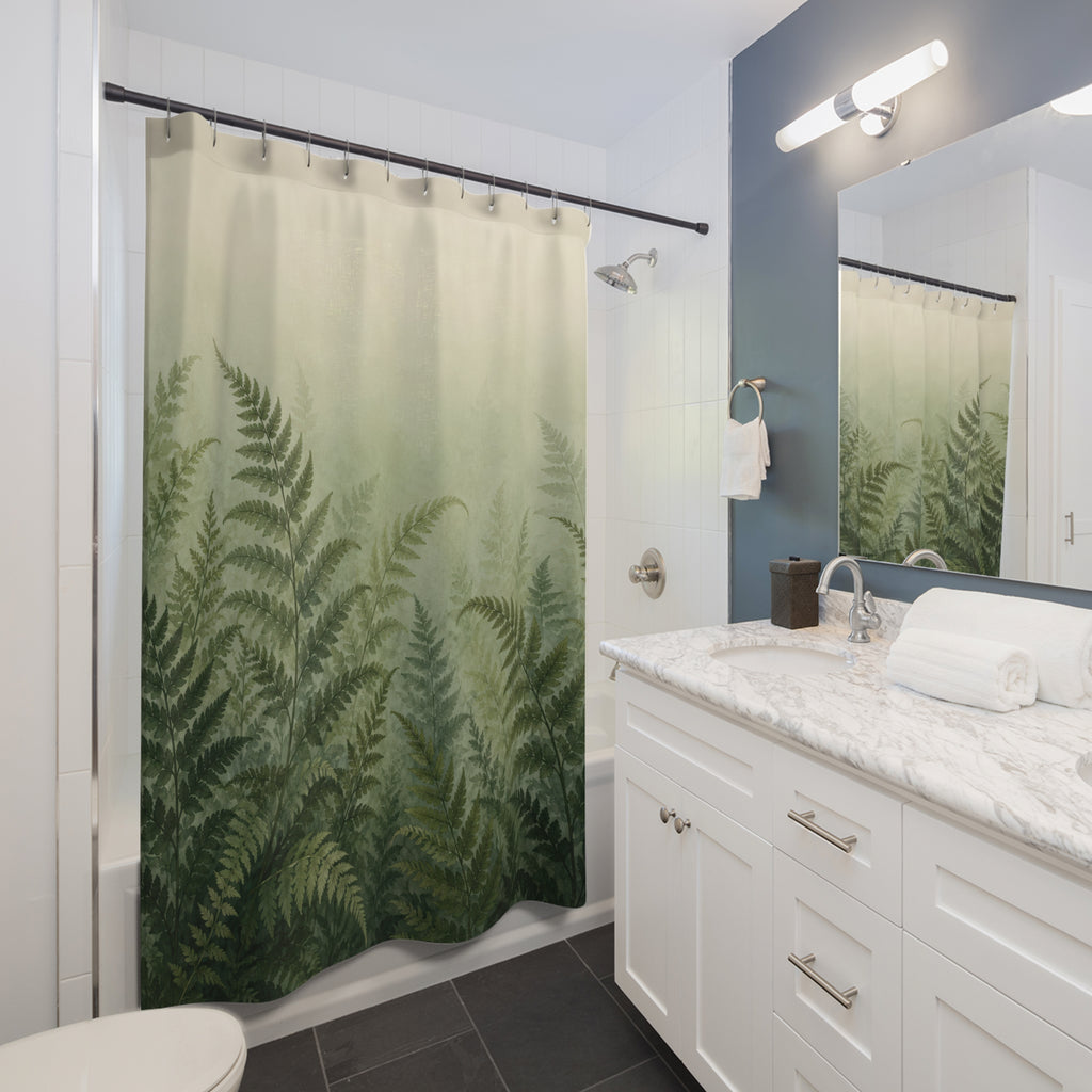 Sage and forest green ferns fading into ivory mist shower curtain beside a white vanity