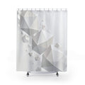 Floating white polyhedra cascading across a pale mist-gray field shower curtain with full front view