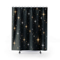 Gold and silver-colored stars on black shower curtain with full front view