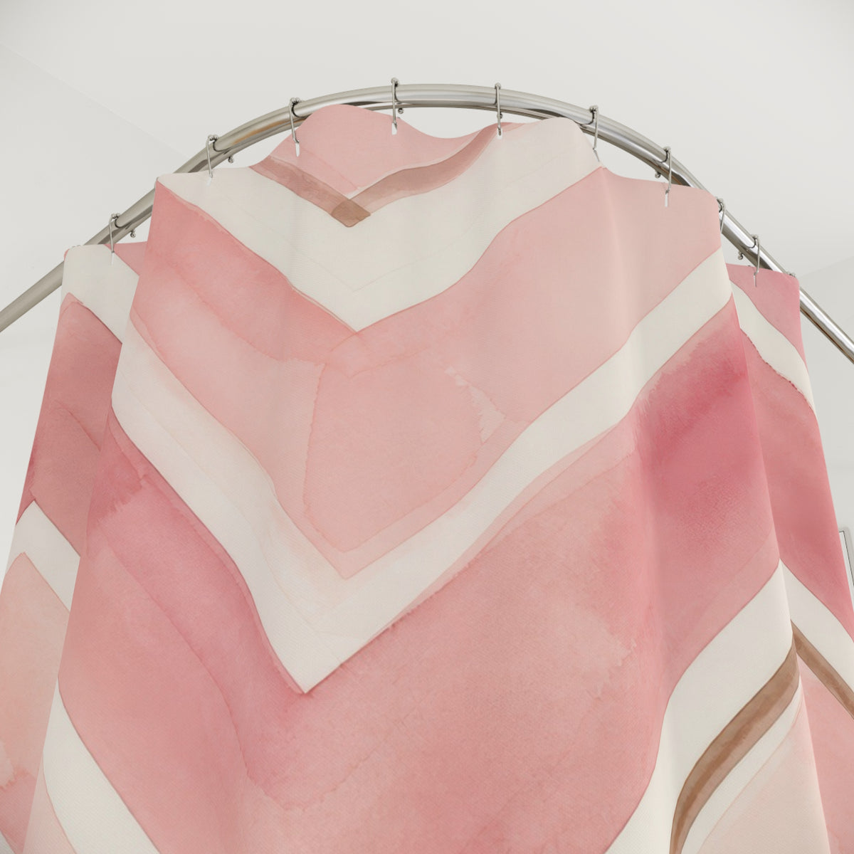 Painted blush pink and ivory chevrons with tan accents shower curtain with close-up print, hooks, and folds