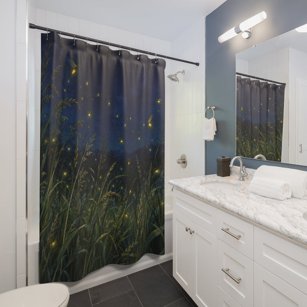 Golden fireflies over green meadow grasses beneath a navy sky shower curtain beside a white vanity