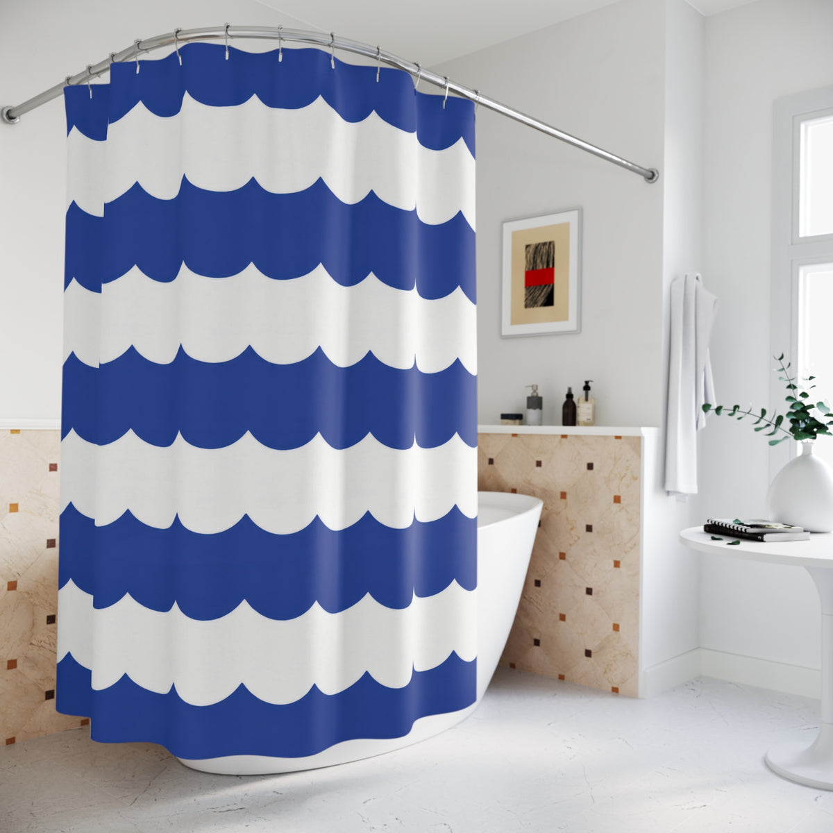 Cobalt and white horizontal scalloped stripes shower curtain beside a freestanding tub